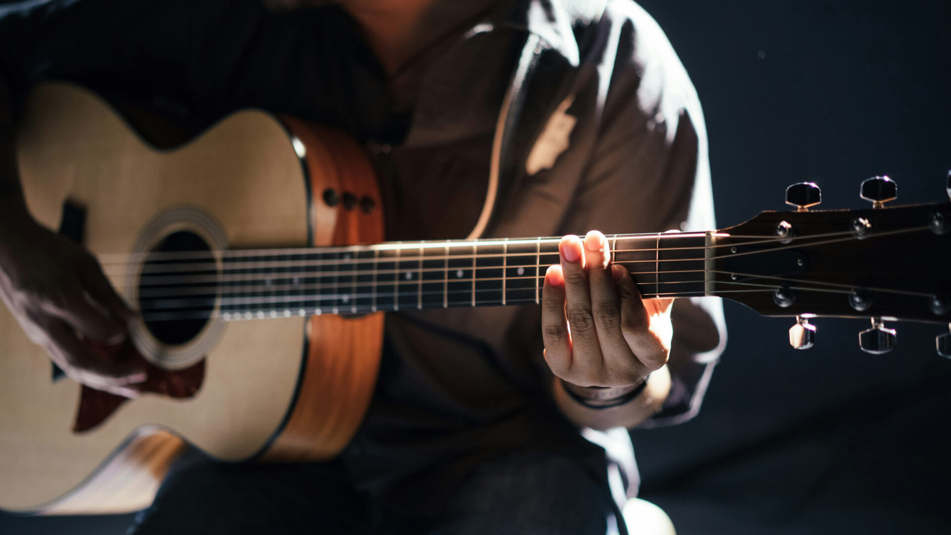 Person playing guitar