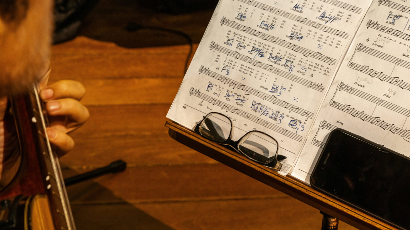 A person reading sheet music